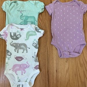 3 coordinating bodysuits